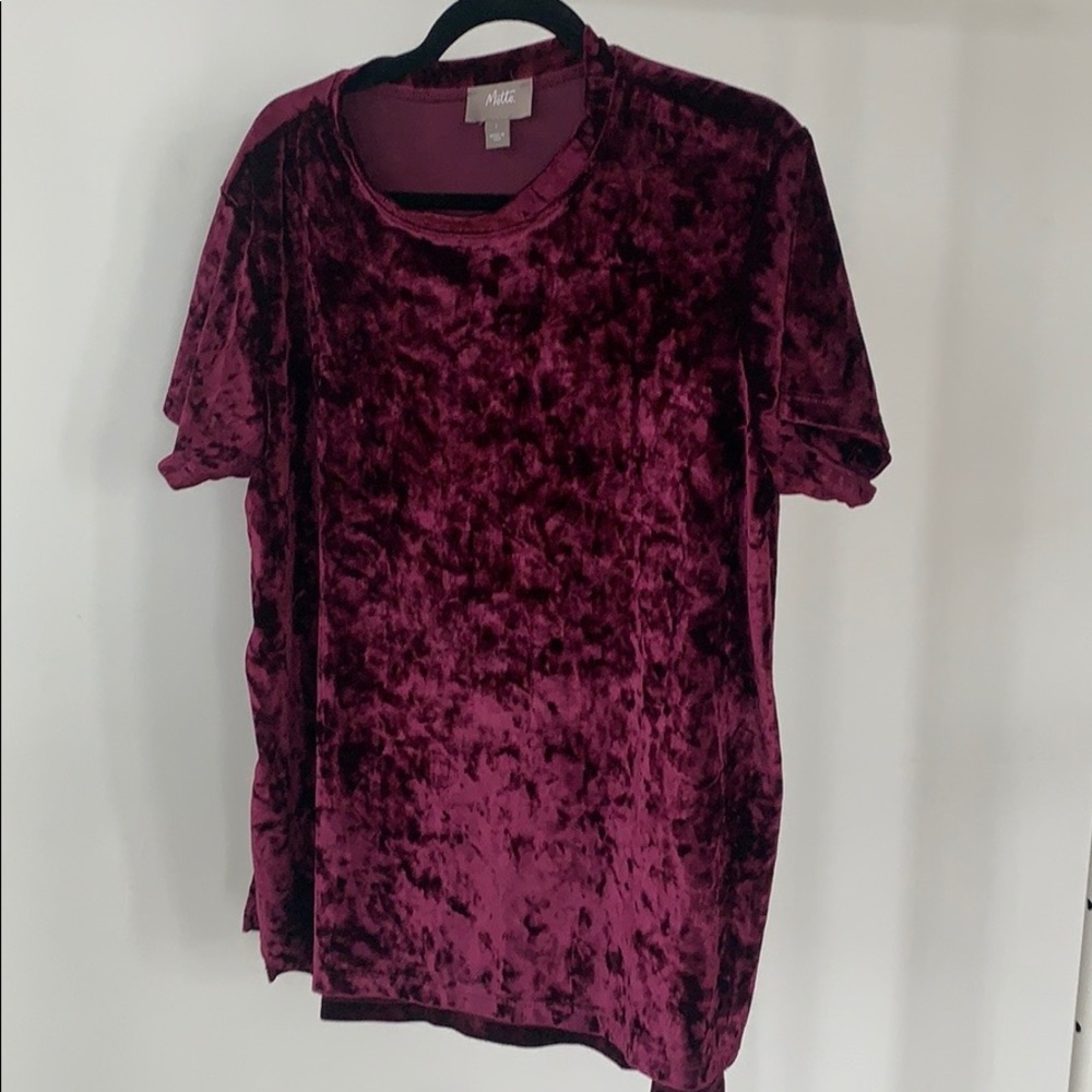 A velvet red top.